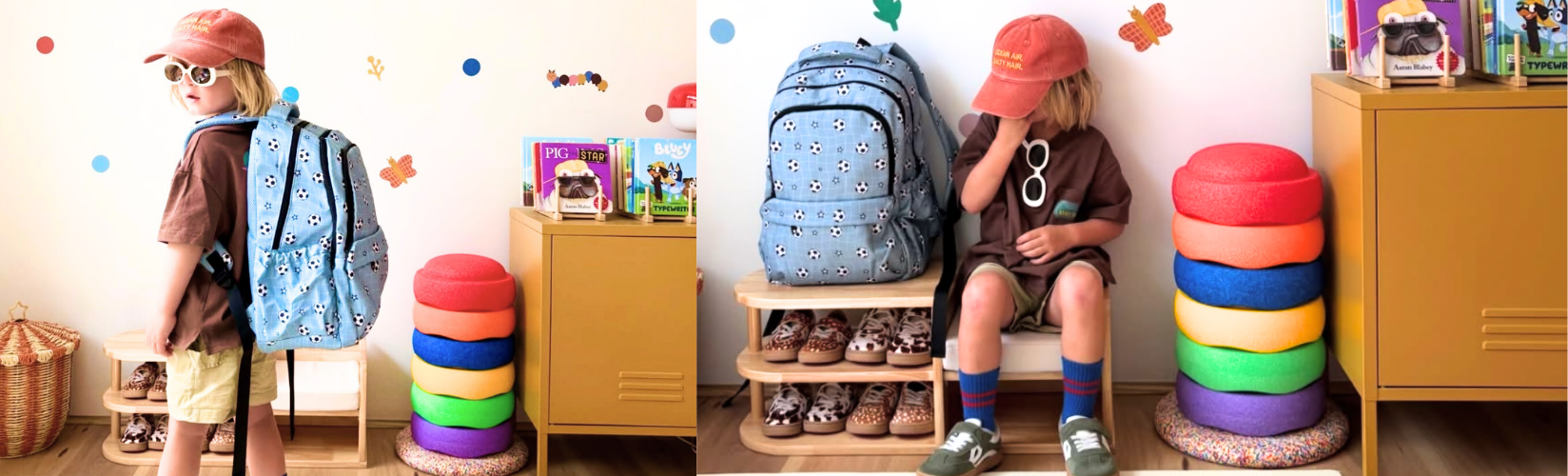 boy wearing soccer star campus backpack