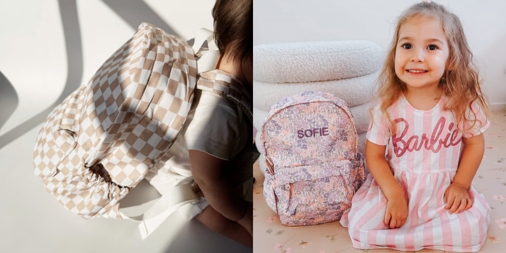 baby boy wearing caramel check mini backpack and baby with blossom mini backpack embroidered