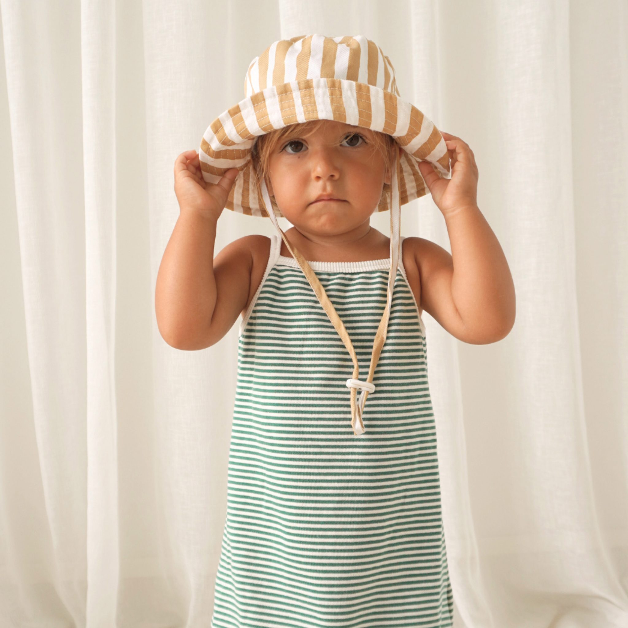 mustard-stripe-bucket-hat-1.png
